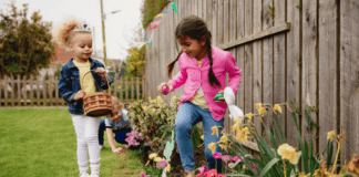kids hunting for Easter eggs in back yard