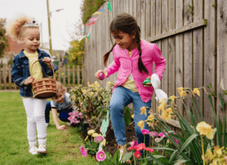 kids hunting for Easter eggs in back yard