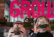 kids holding terrariums they made at GROW in Wichita