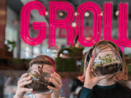 kids holding terrariums they made at GROW in Wichita