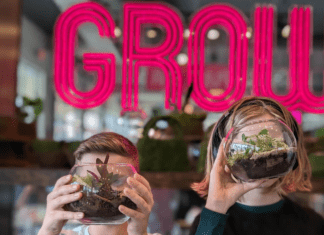 kids holding terrariums they made at GROW in Wichita