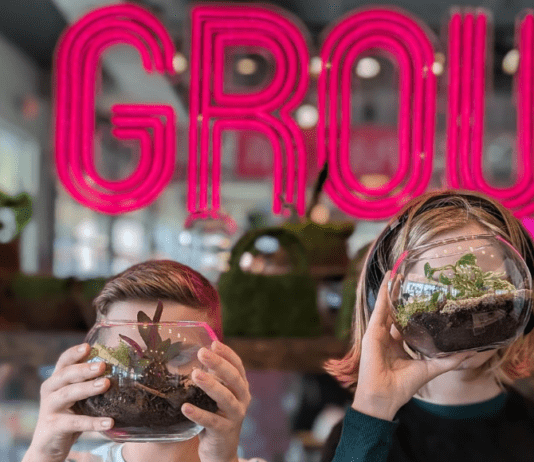 kids holding terrariums they made at GROW in Wichita